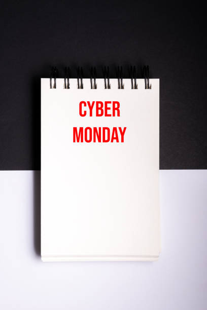 istock mock up cyber monday sale with note pad on black and white background 1441415936
