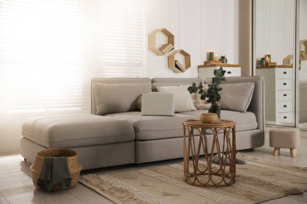 istock Living room with comfortable grey sofa and stylish interior elements 1441416118