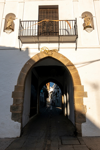 Zafra, Badajoz, Spain-October 30, 2022: Exterior facade of the Arco de Jerez, one of the very old gateways to the town of Zafra, province of Badajoz, Autonomous Community of Extremadura, Spain.