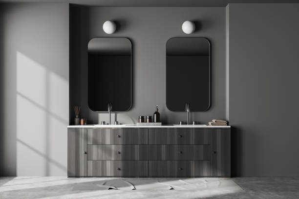 istock Grey bathroom interior with double sink and dresser with accessories 1441418671