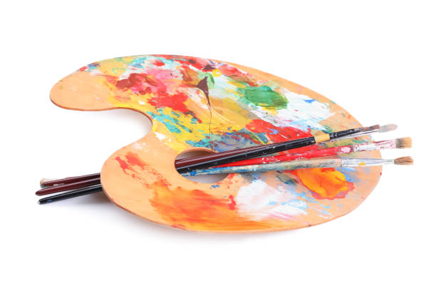 istock Palette with paints and brushes on white background. Artist equipment 1441419666