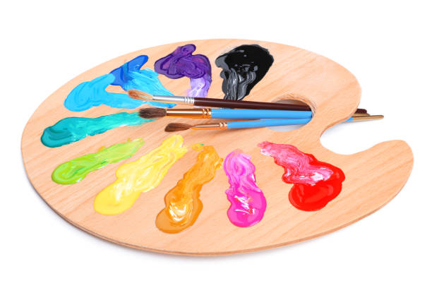 istock Palette with paints and brushes on white background. Artist equipment 1441419726