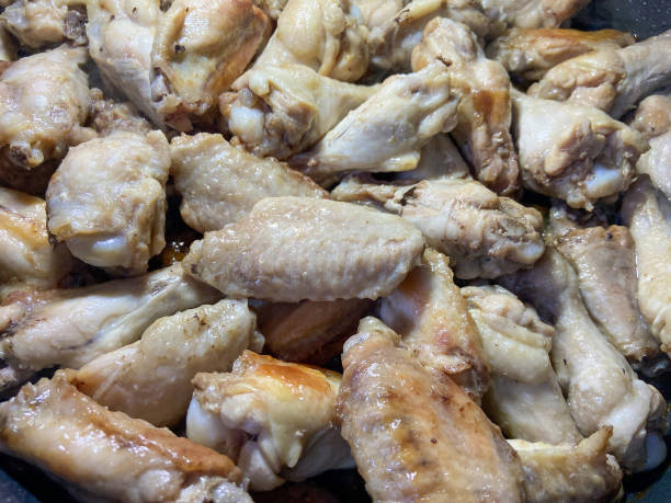 istock Chicken wings in the cooking pan 1441419898