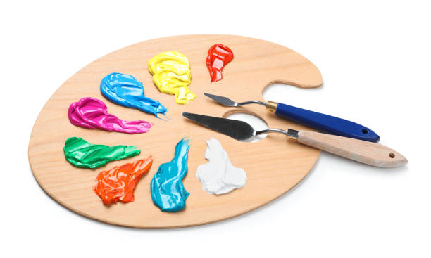 istock Palette with paints and spatulas on white background. Artist equipment 1441420102