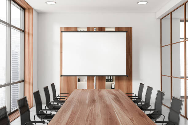 istock Business room with board and seats, panoramic window. Mockup projector screen 1441420702