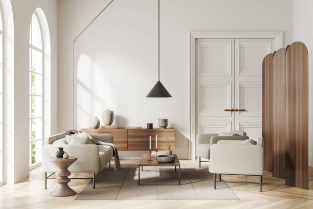 istock Front view on bright living room interior with armchairs, sofa 1441421187