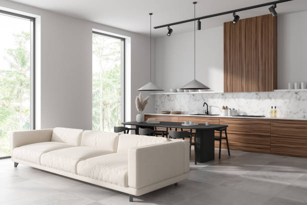 istock Stylish studio interior with chill and dining area, panoramic window 1441421958
