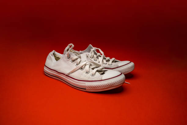 istock White shoes on red floor 1441424801