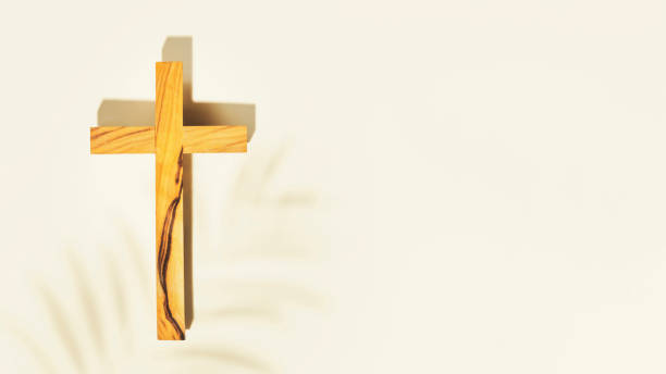 istock Wooden crucifixion with palm leaf shadow and copy space 1441428062