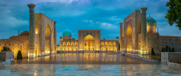 Panoramic view of Registan square, Samarkand, Uzbekistan with three madrasahs: Ulugh Beg, Tilya Kori and Sher-Dor Madrasah. Panoramic view of Registan square, Samarkand, Uzbekistan with three madrasahs: Ulugh Beg, Tilya Kori and Sher-Dor Madrasah. samarkand urban stock pictures, royalty-free photos & images