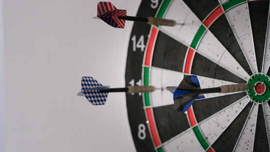 dartboard and arrows on target