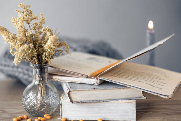 istock Cozy home composition with books on the table close-up. 1441437580
