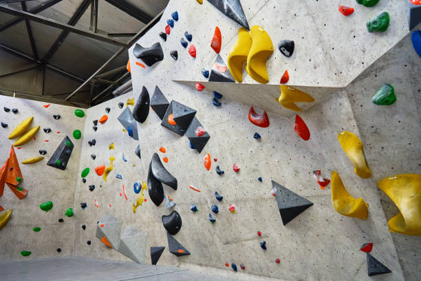 istock Bouldering gym with artificial colourful rock wall 1441438964
