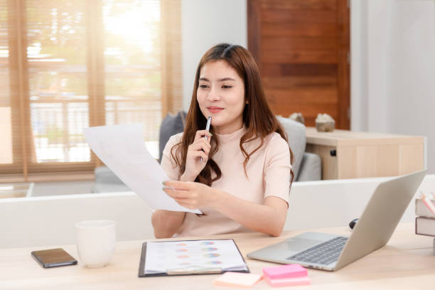 istock Asian beauty Work online from home via computer Interacting with the team Is a new normal online activity. 1441441787