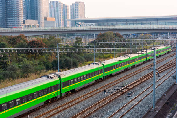 istock China Railway, green train running at the railway station 1441442655