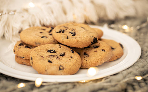 Cookies with chocolate chips close-up on a plate. stock photo