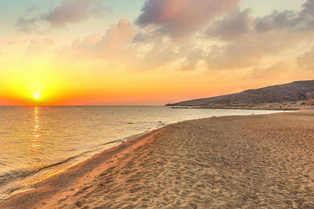 istock The sunrise from the sandy beach Psathi in Ios island, Greece 1441444696