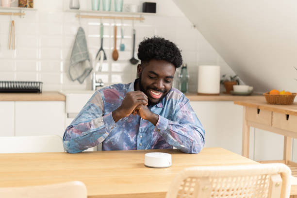 istock African American young man using a smart hub at home 1441445520