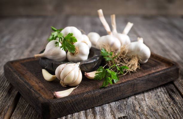 Fresh organic garlic on the wooden table