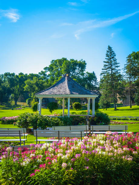 istock Beautiful pavilion garden with vibrant spring flowers 1441447402