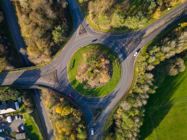 istock A small traffic roundabout surrounded by beautiful autumn coloured leaves 1441447615