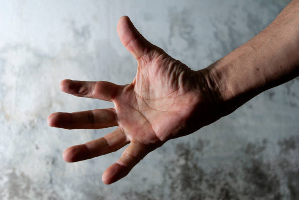 istock Older man's hands, anatomical detail, skin texture, expression and manual language, working man's hand. 1441454368