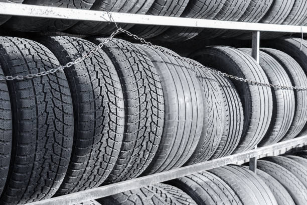 istock Old car tires for sale 1441454996