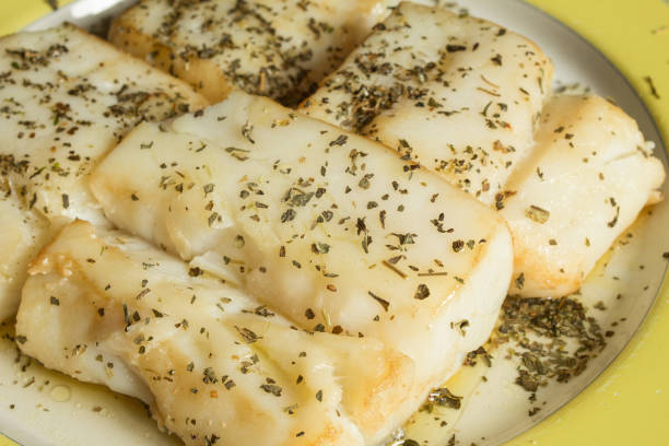 istock Close up of cod dish in sauce with spices. 1441459563