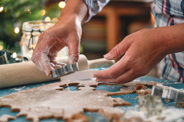 istock Preparing Gingerbread Christmas Cookies in Domestic Kitchen 1441465365
