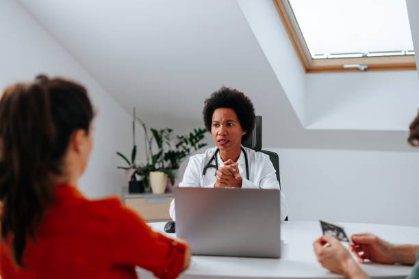 istock Couple consultation with obstetrician. 1441467542
