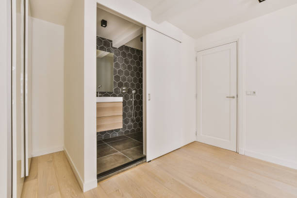 istock Small bathroom with ceramic sink and shower system 1441468426