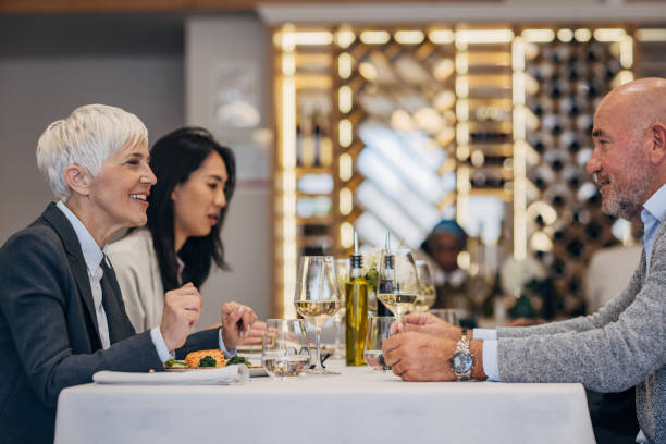 istock People on lunch in luxury restaurant 1441474817