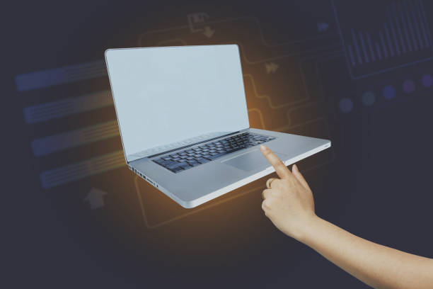istock Hand working on blank screen laptop computer on desk as concept with social media diagram,Social distancing and Working from home concept. 1441477637