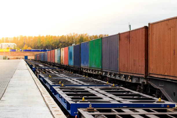 istock Freight train. Cargo containers transportation by railway. Impoert export logistics concept. Shipping by train. Cargo train platform. 1441478191