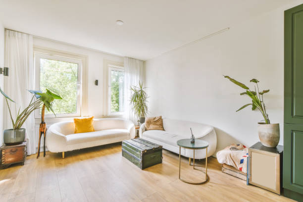 istock A cozy living room decorated with several soft sofas 1441478709