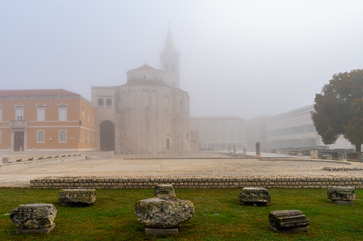 Roman forum and church of St. Donat on a foggy morning in Zadar, Croatia