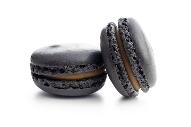 istock Sweet macaron dessert. Macarons isolated on white background. 1441482641