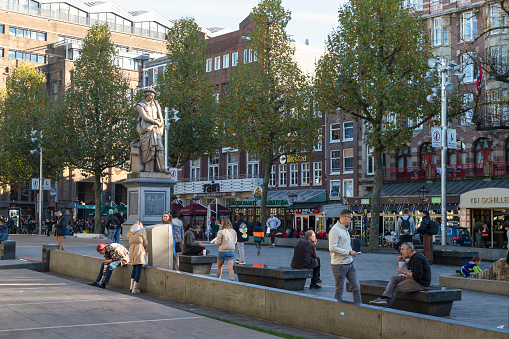 Amsterdam, Netherlands, November 13, 2022; Tourists and residents enjoy the beautiful autumn weather on the famous Rembrandtplein in the center of Amsterdam.