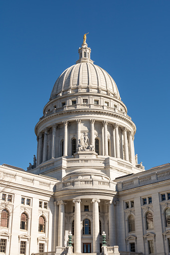 Morning light on the Wisconsin state capitol building  in late fall.  Madison, Wisconsin, USA.