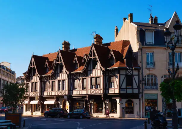 Streets of Reims with view of half-timbered building. Old-fashioned house in France.