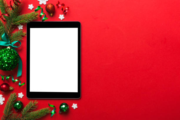 digital tablet mock up with rustic christmas decorations for app presentation top view with empty space for you design. christmas online shopping concept. tablet with copy space on colored background - celebration imagens e fotografias de stock