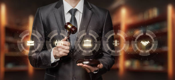 Lawyer showing legal services on virtual screen. stock photo