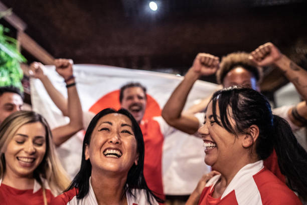 istock Friends rooting for their team and celebrating 1441493736