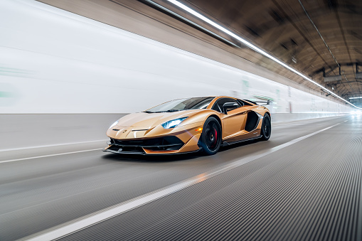 Seattle, WA, USA
November 13, 2022
Lamborghini Aventador SVJ driving on the street with lights on