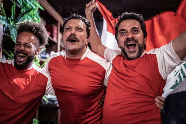 istock Friends rooting for their team and celebrating 1441498299