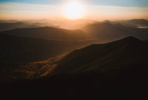 Dramatic all sunrise over White Mountains, New Hampshire stock photo