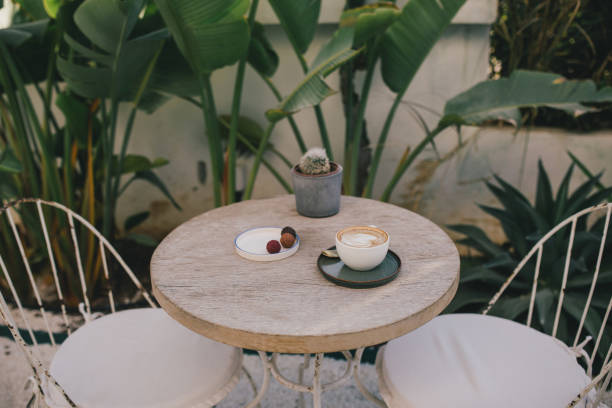 istock A cup of coffee with candies on the table. 1441510851