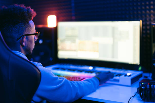 istock Young sound producer working at studio 1441512182