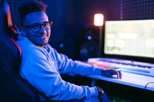 istock Young sound producer working at studio 1441512188