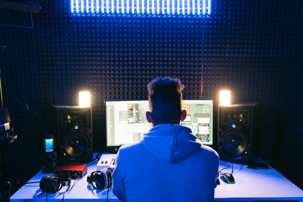 istock Young sound producer working at studio 1441512249